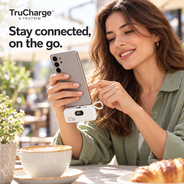 TruCharge USB-C lifestyle illustration — phone charging at a cafe