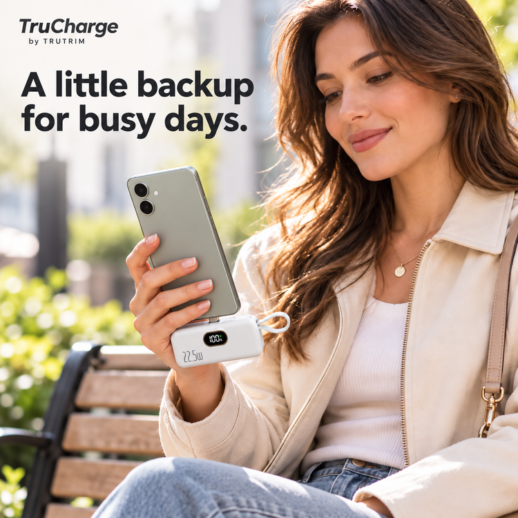 TruCharge USB-C lifestyle illustration — phone charging during a day out